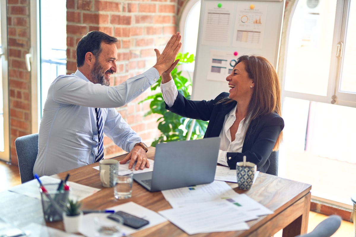 Advisors celebrating a closed claim